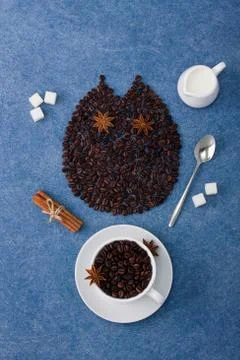 Coffee composition owl cup of coffee milk sugar spoons cinnamon Stock Photos