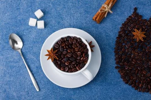 Coffee composition owl cup of coffee milk sugar spoons cinnamon Stock Photos
