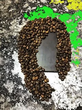 Coffee composition of roasted beans and dark chocolate. Concept composition. Stock Photos