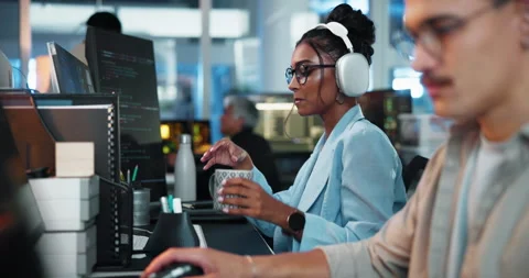 Coffee, computer and music with programmer woman in office for coworking or Stock Footage 309142654