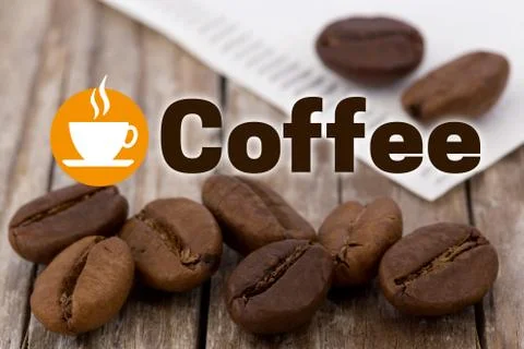 Coffee concept background with coffee beans and wood Stock Photos