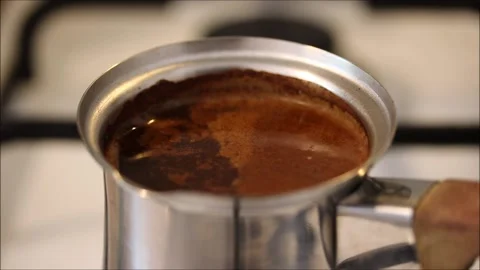 Coffee is cooking on the stove in the kitchen Video stock 154418622
