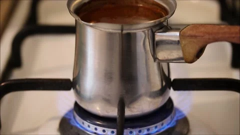 Coffee is cooking on the stove in the kitchen Video stock 154418651