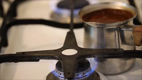 Coffee is cooking on the stove in the kitchen Stock Footage 154419010