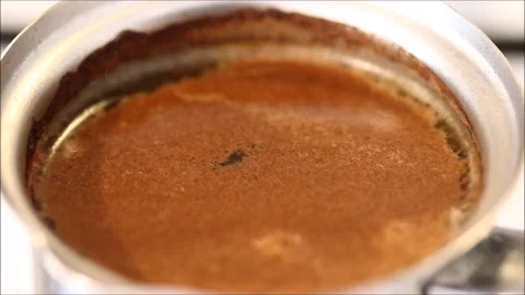 Coffee is cooking on the stove in the kitchen Video stock 154419089