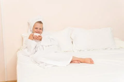 Coffee copyspace bathrobe bed cell girl white portrait morning people, concept Stock Photos