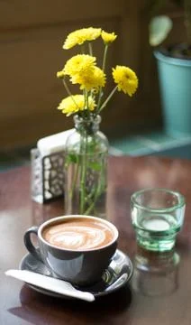 Coffee in a cozy cafe Stock Photos