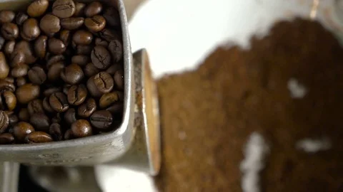 Coffee is crushed in a coffee grinder Video stock 76717892
