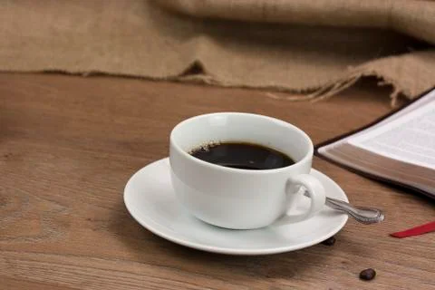 Coffee cup against a rustic background Stock Photos