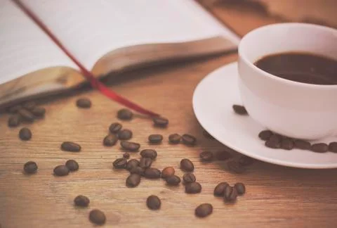 Coffee cup against a rustic background Stock Photos
