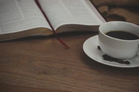 Coffee cup against a rustic background Stock Photos