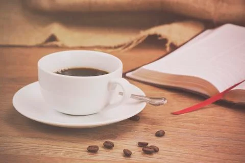 Coffee cup against a rustic background Stock Photos