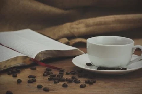 Coffee cup against a rustic background Stock Photos
