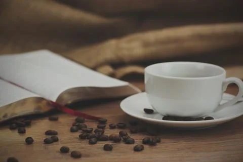 Coffee cup against a rustic background Stock Photos