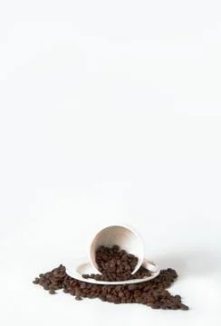 Coffee cup and beans on old kitchen table. Top view with copyspa for your tex Stock Photos