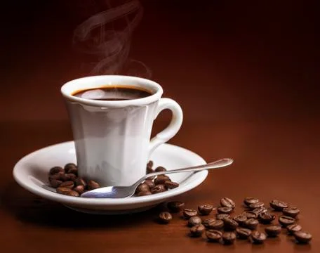 Coffee cup and beans  Stock Photos