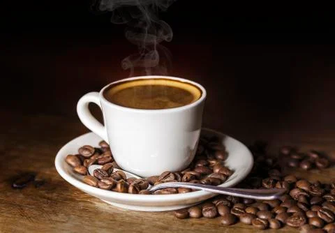 Coffee cup and beans  Stock Photos
