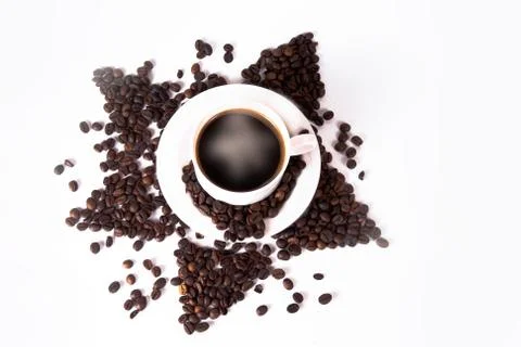 Coffee cup and beans. Stock Photos