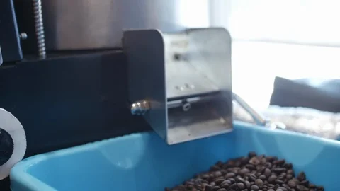 Coffee cup and coffee beans. A white cup of evaporating coffee on the table with Stock Footage 100126370