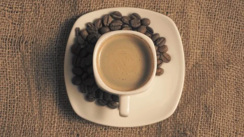 Coffee cup and coffee beans Stock Footage 103682657