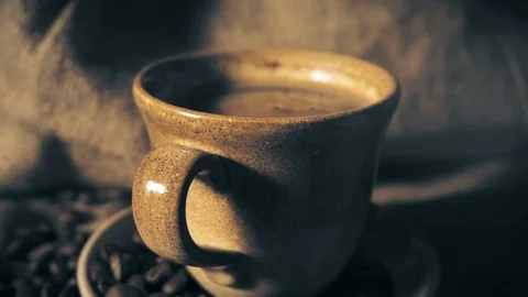 Coffee cup and coffee beans Stock Footage 104316559