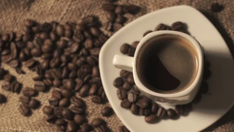 Coffee cup and coffee beans Stock Footage 104694154