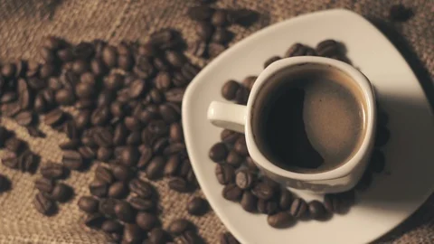 Coffee cup and coffee beans Stock Footage 104695277