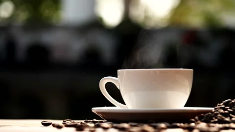 Coffee cup and coffee beans with natural steam smoke of coffee Stock Footage 148026153
