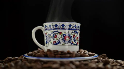 Coffee cup and coffee beans. Hot ceramic coffee cup with smoke Stock Footage 199267912