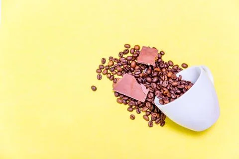 Coffee cup and coffee beans on white background Stock Photos