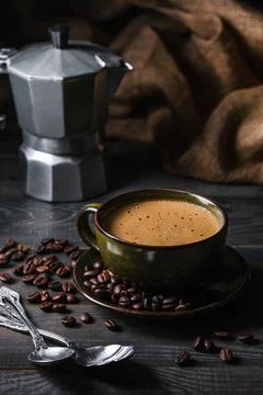 Coffee cup and coffee beans Stock Photos