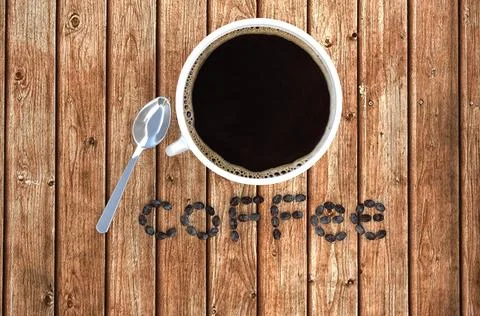 Coffee cup and coffee beans on wood table . 3D rendering Stock Photos