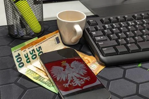 Coffee cup and computer keyboard on desk  modern workspace and productivity.. Stock Photos
