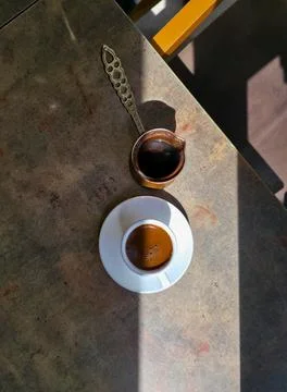 Coffee Cup and Pitcher on Table 写真素材