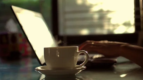 Coffee cup and play computer 3 Stock Footage 109057765