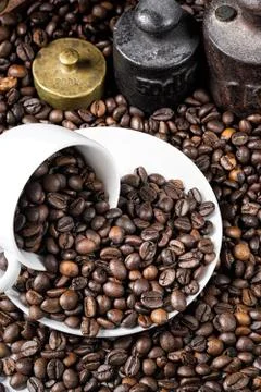 Coffee cup and rustic weight Stock Photos