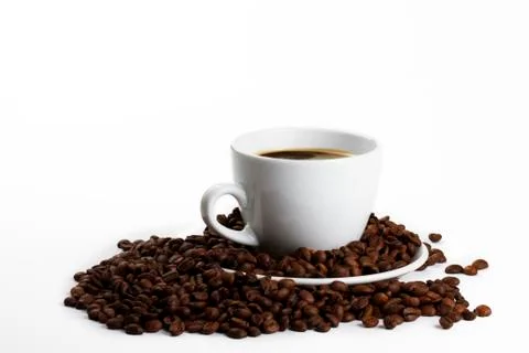 Coffee cup with beans Stock Photos