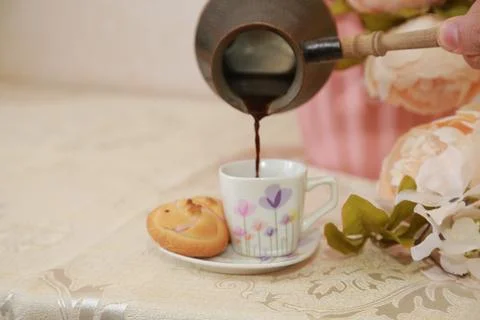 Coffee cup black drink invigorating and food snack sweet cake, confectionery Stock Photos