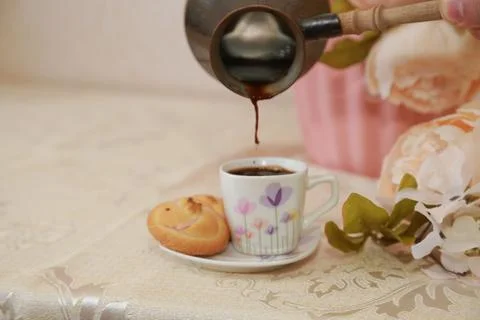 Coffee cup black drink invigorating and food snack sweet cake, confectionery Stock Photos
