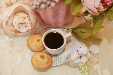 Coffee cup black drink invigorating and food snack sweet cake, confectionery Stock Photos