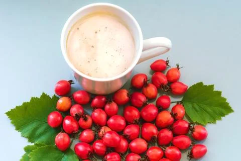 Coffee in a cup on a blue background Stock Photos