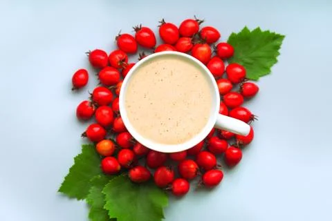 Coffee in a cup on a blue background Stock Photos