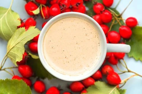 Coffee in a cup on a blue background Stock Photos