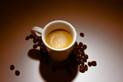 Coffee cup on brown background Stock Photos