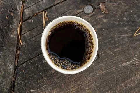 Coffee cup on a camp table Stock Photos