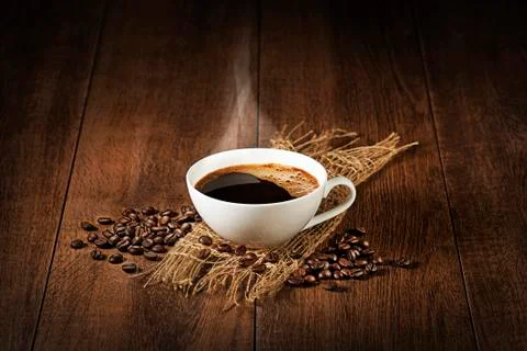 Coffee cup with coffee beans background Stockfoto's