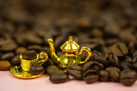 Coffee cup with coffee beans, mini cup, miniature cup Stock Photos