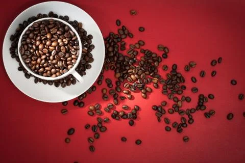 Coffee cup with coffee beans. Stock Photos