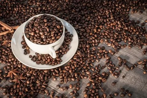 Coffee cup with coffee beans. Stock Photos