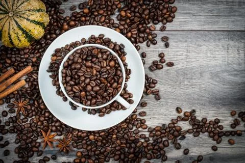 Coffee cup with coffee beans. Stock Photos
